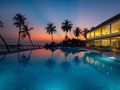 tennishotel reethi faru resort pool sunset