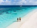 tennishotel reethi faru resort water beach2