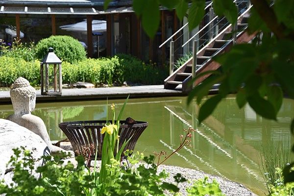 Tennis hotel wellness garden Sepp Baumgartner swimming pond